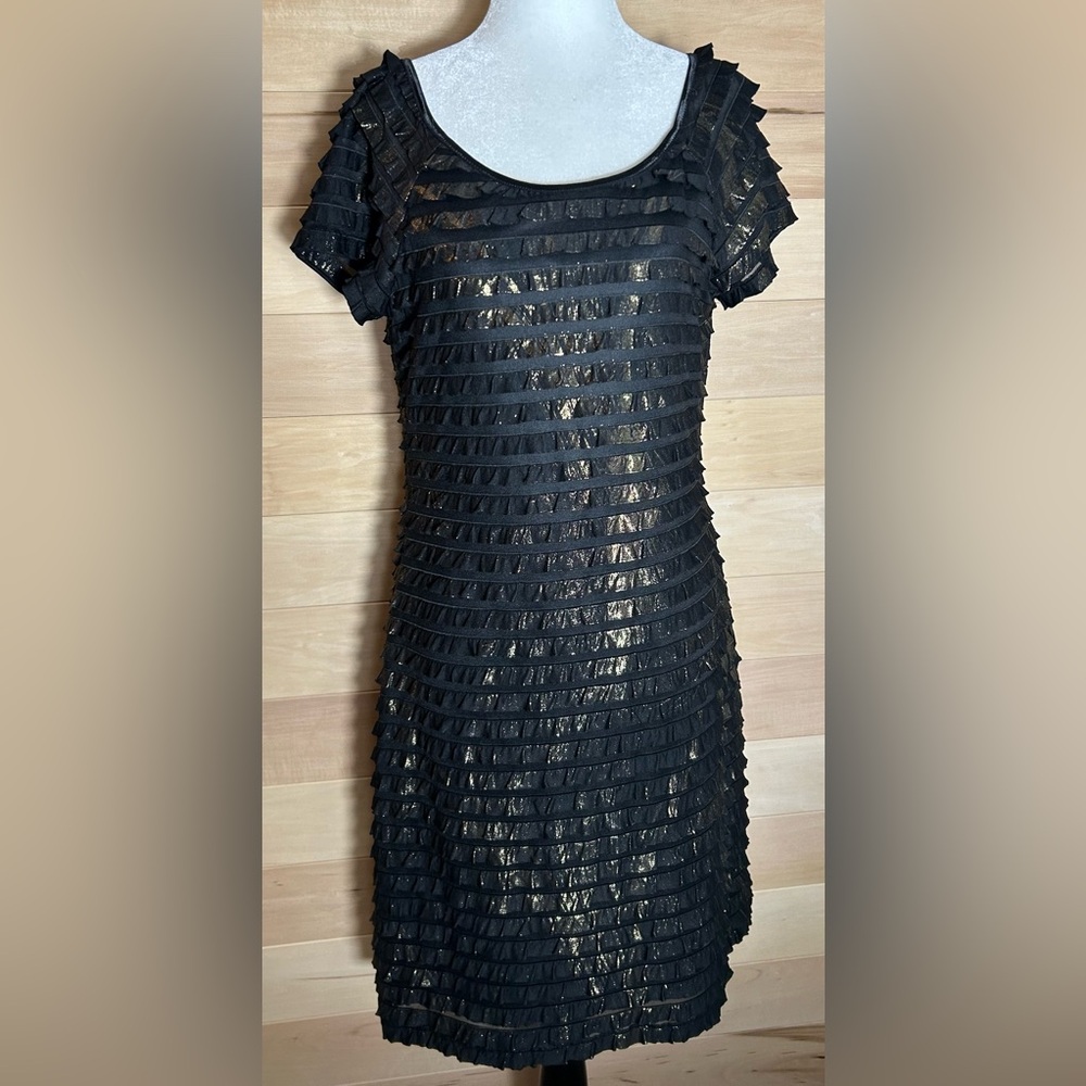 Connected apparel, Size 12 black and gold frills dress with built in slip.